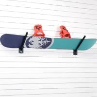Snowboard securely hung on MKE Slatwall with angled hook brackets.
