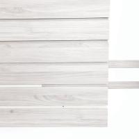 Whitewood laminate PVC slot inserts designed for enhanced garage or retail space organization, seamlessly fitting into slatwall panels.