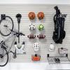 Organized garage with slatwall panels showcasing efficient use of vertical storage space.
