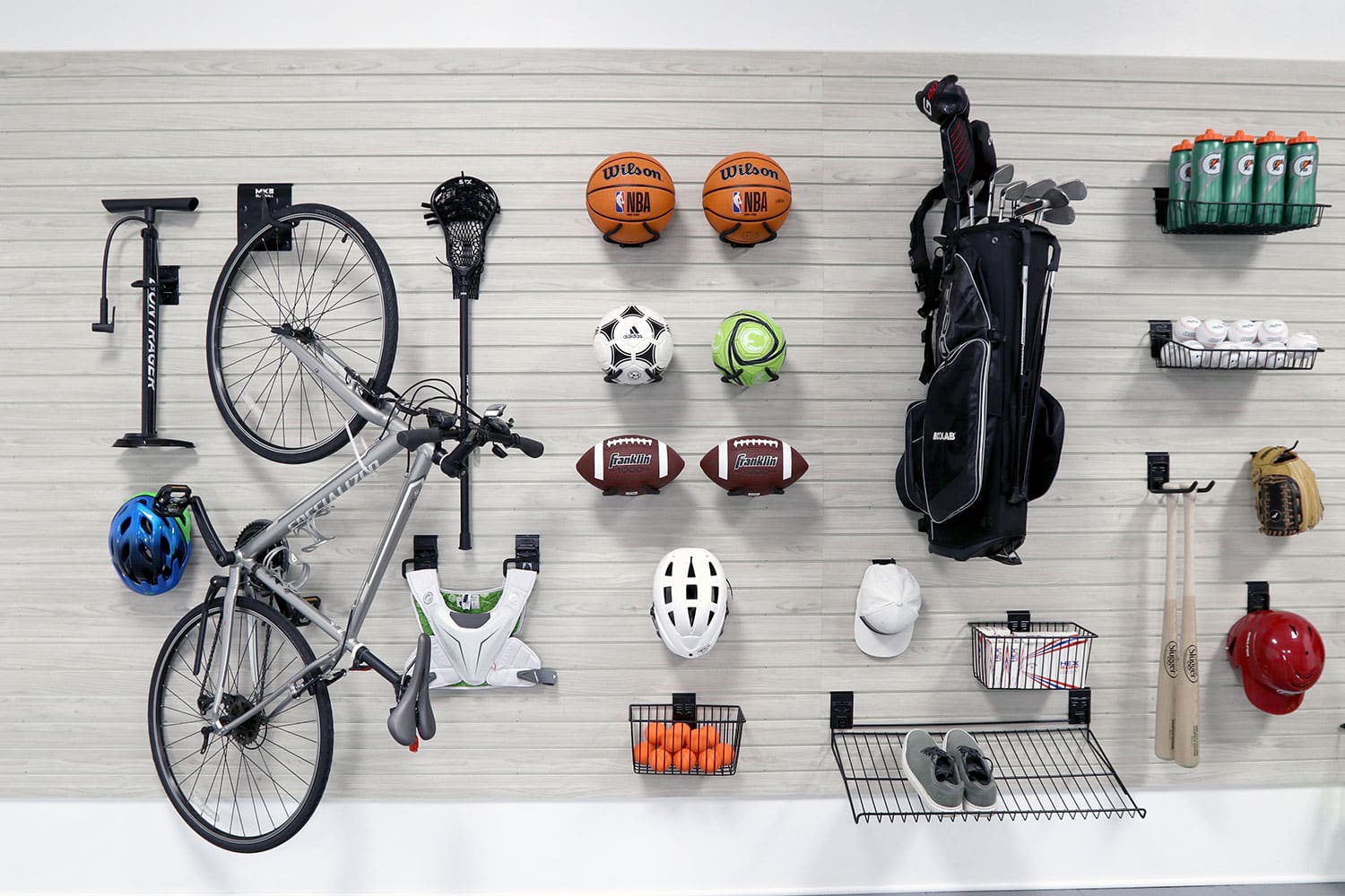 Garage kid zone with slatwall panels for organized toy storage